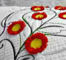 Red Fringe Flower Embroidery for Texture using Water Soluble Thread in the Bobbin